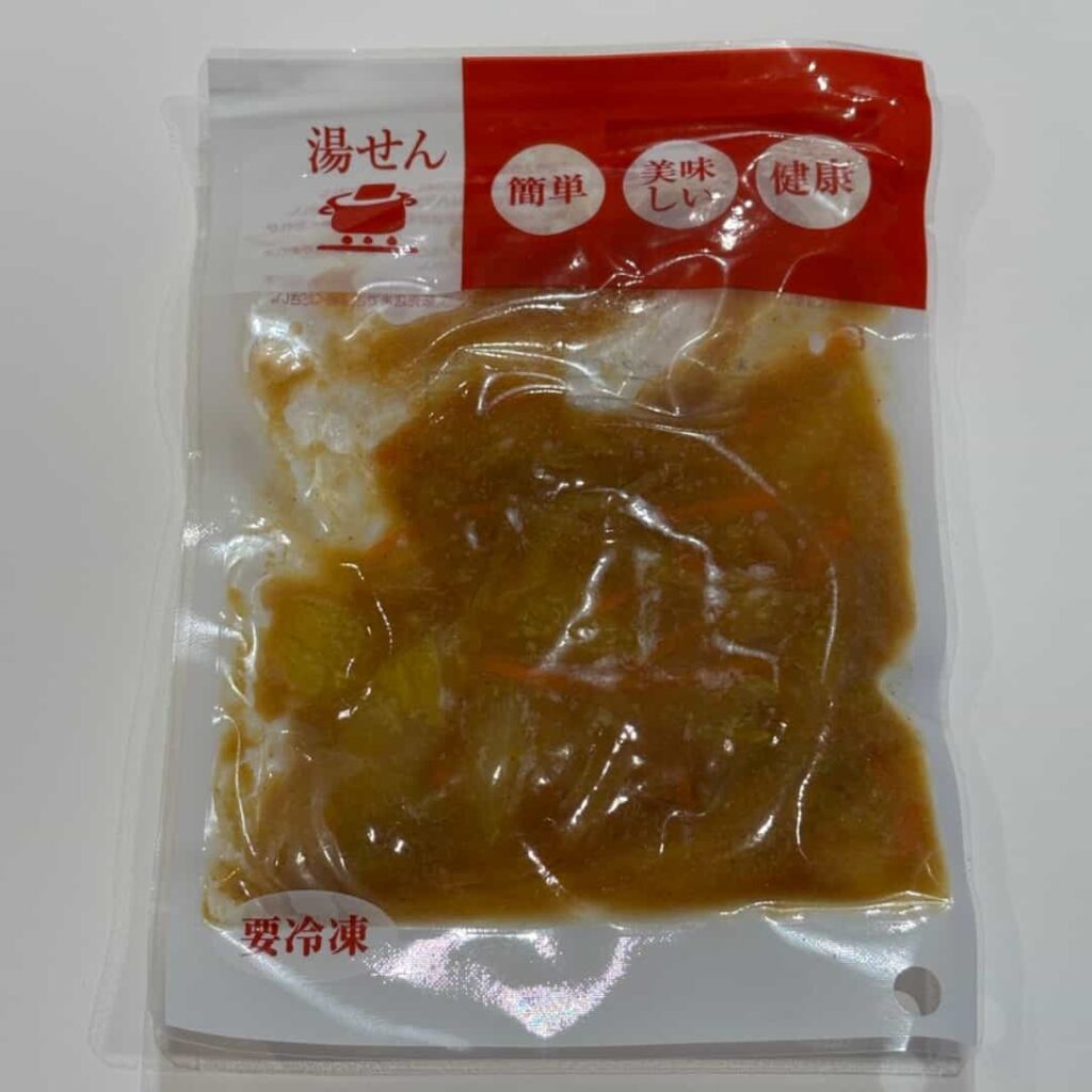 キャベツと豆もやしのカレー煮込み（パッケージ）の写真